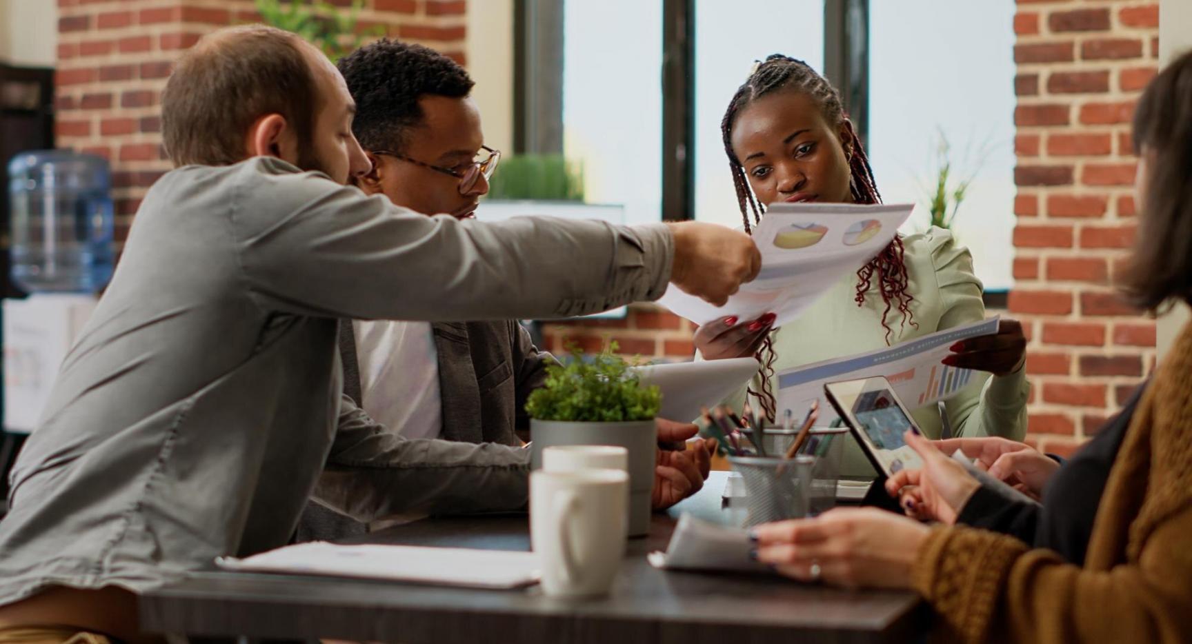 Financial planning session with calculator and budgeting materials